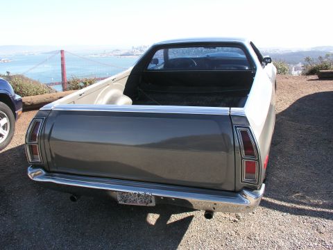 1972 Ford Ranchero - A 1972 Ford Ranchero is parked with a view of the Golden Gate Bridge and San Francisco skyline.