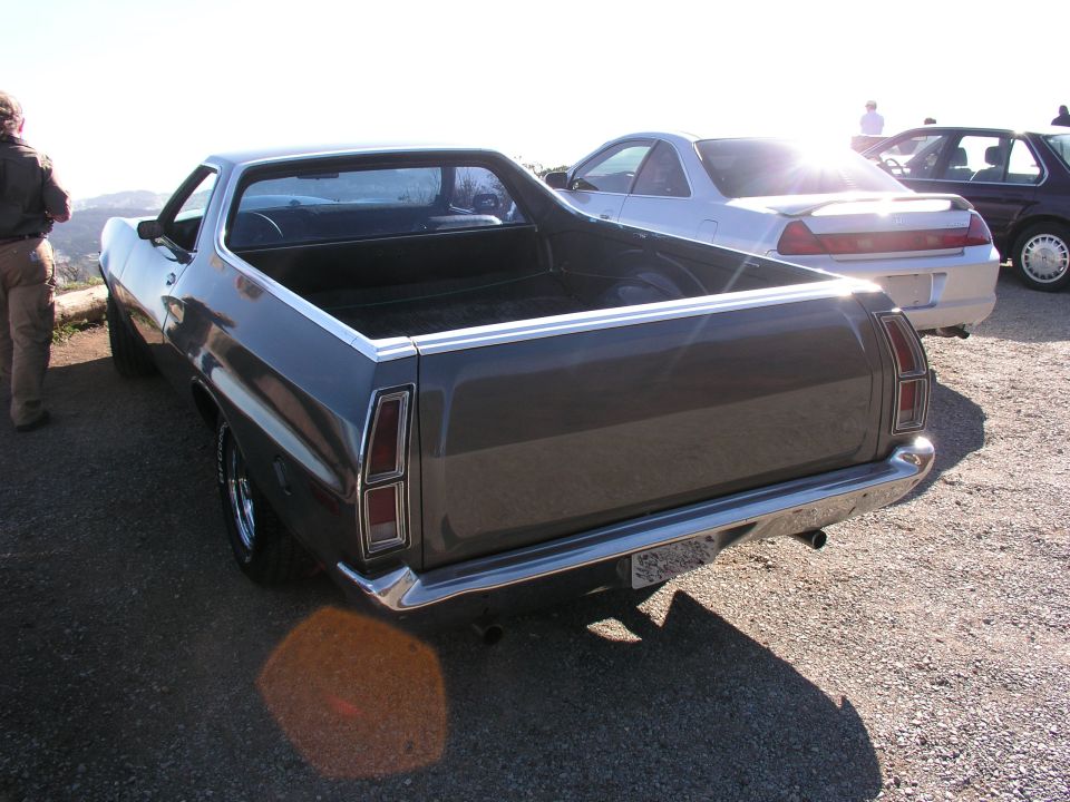 1972 Ford Ranchero rear view, parked with other vehicles