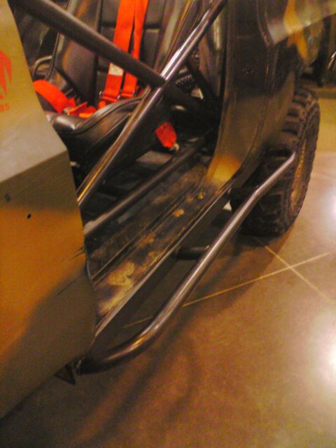 1993 Ford Bronco - Custom interior of an off-road vehicle with racing seats and a roll cage.