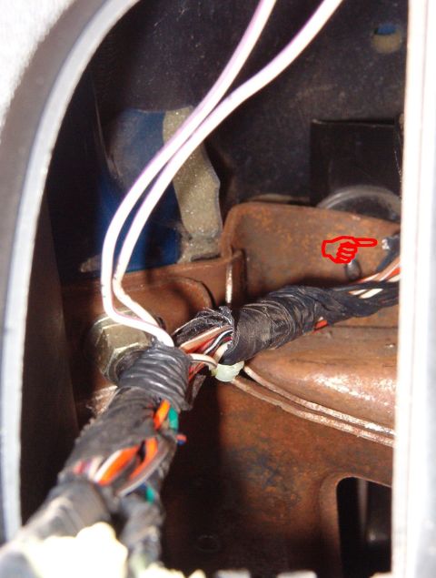 1999 Ford Crown Victoria - I cut the wires at the splice, trying to leave some of the insulation & tape intact so it won't short out & blow a fuse later when it's tuc…