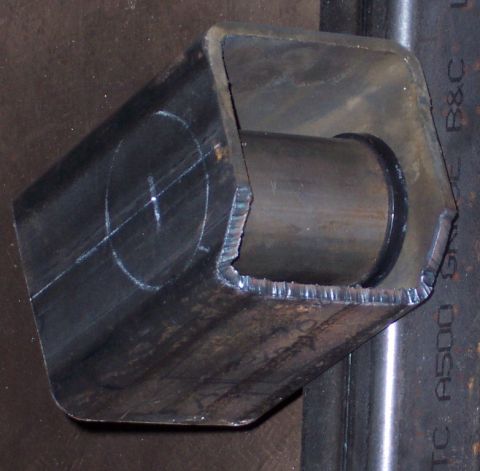 1978 Ford Bronco - A fabricated metal component with chalk markings and rough cut edges is shown.