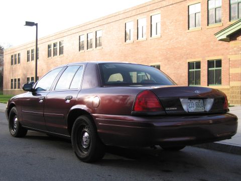 1991 Ford LTD Crown Victoria - Rear view of a maroon Ford Crown Victoria showing its license plate.