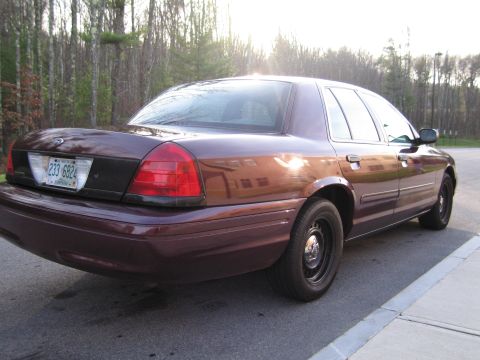 1991 Ford LTD Crown Victoria - This Ford Crown Victoria sedan, seen from the rear quarter, is a 2001 model based on its body style.