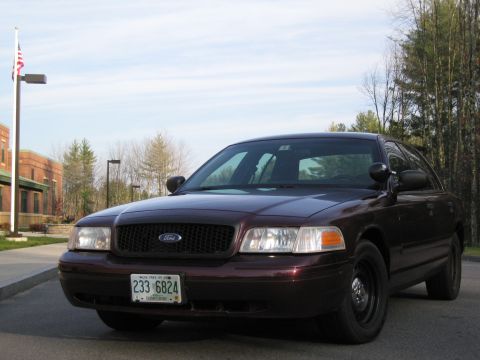 1991 Ford LTD Crown Victoria - Ford Crown Victoria Police Interceptor with a black grille and steel wheels.