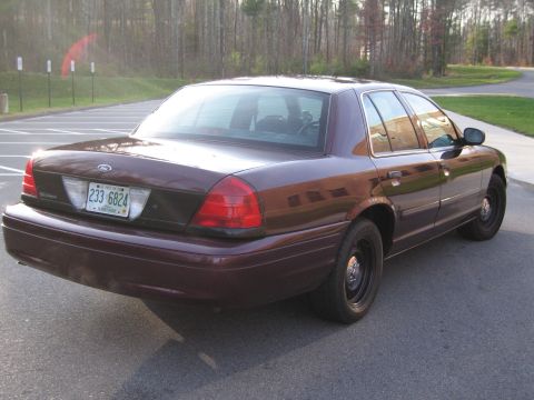 1991 Ford LTD Crown Victoria - This Ford Crown Victoria has a distinctive body style that suggests a later model year than 1991.