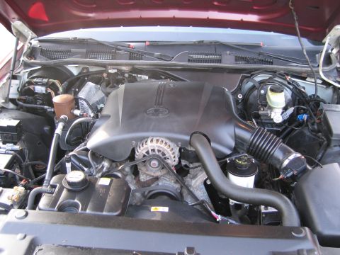 1991 Ford LTD Crown Victoria - Engine compartment of a Ford Crown Victoria, showing the V8 engine and associated components.