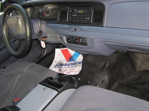 1991 Ford LTD Crown Victoria - Interior view of a 1991 Ford Crown Victoria LTD, the dashboard and seating area.