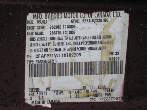 1991 Ford LTD Crown Victoria - Ford door-jamb certification data plate showing VIN, gross vehicle weight ratings, and build information.