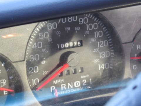 1991 Ford LTD Crown Victoria - The odometer shows over 100,000 miles on this vehicle's dashboard.