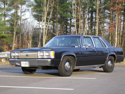 1991 Ford LTD Crown Victoria - This Ford Crown Victoria has a distinctive grille and headlight design, indicating an earlier model year than claimed.
