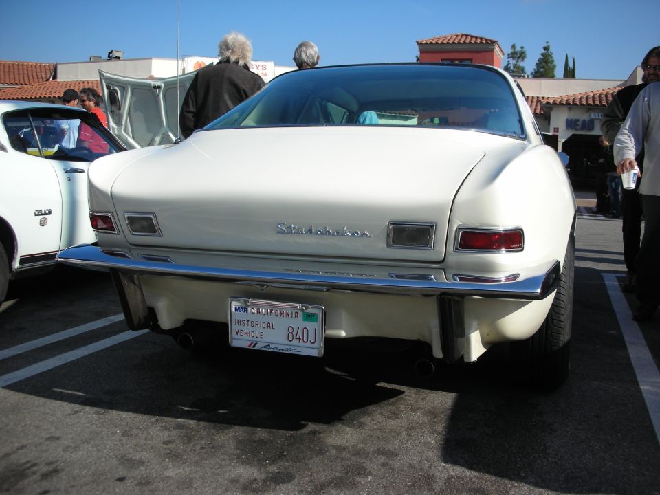 Rear of a white Studebaker Avanti with California historic-vehicle plate 840J