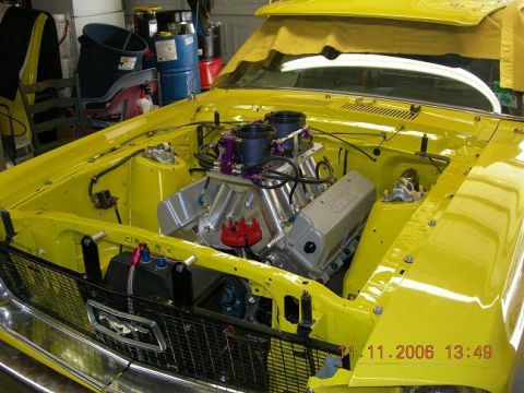 1972 Ford Ranchero - Custom V8 engine in a 1972 Ford Ranchero, dual carburetors and a yellow finish.
