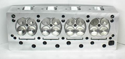 1972 Ford Ranchero - This is a close-up view of an aluminum V8 engine cylinder head, showing the valves and ports.