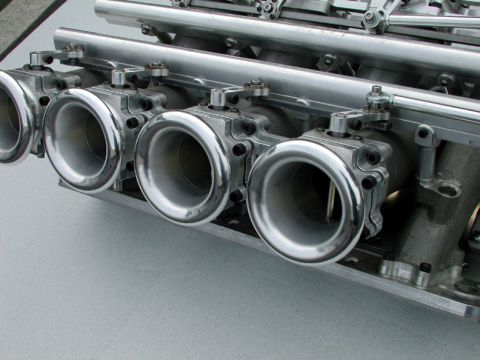 1972 Ford Ranchero - This intake manifold features four individual throttle bodies for enhanced engine performance.