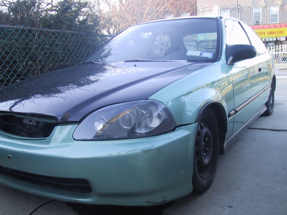 1996 Honda Civic, light green, black hood, front 3/4 view, steel wheels, minor damage on bumper