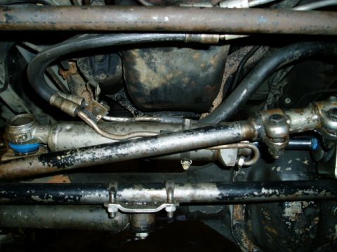 2000 Ford E350 - Underside view of steering and suspension parts, likely from a van or truck.