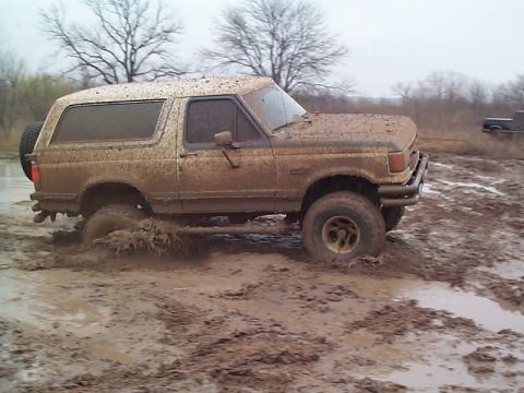 1990 Ford Bronco - side muddy