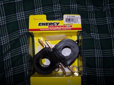 1995 Ford Probe - New swaybar bushings are shown in their retail packaging, ready for installation.