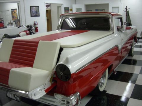 1957 Ford Ranchero - This 1957 Ford Ranchero features a unique custom bed conversion with integrated red and white seating.