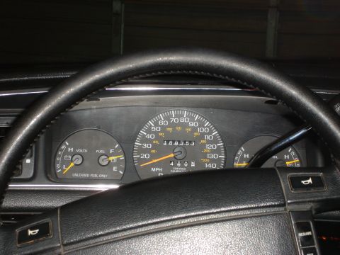 1992 Ford Crown Victoria - The interior dashboard shows the odometer reading and various gauges.