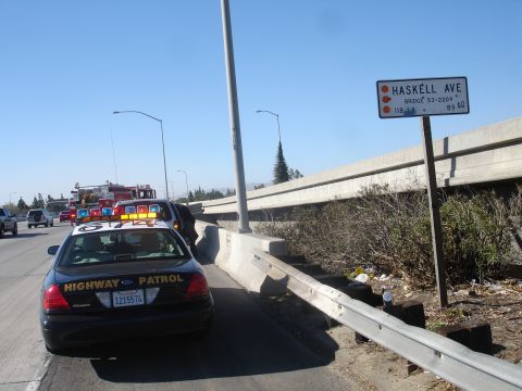 1993 Ford Taurus - Highway patrol and fire department respond to an incident on the freeway.