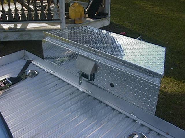 Diamond plate toolbox on trailer bed