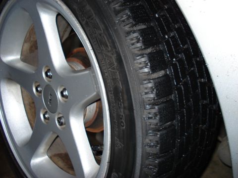 1998 Ford Taurus - Wheel and tire detail, likely for winter driving conditions.