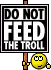 1990 Ford Bronco - A sign warns against feeding the troll, accompanied by a cartoon troll character.