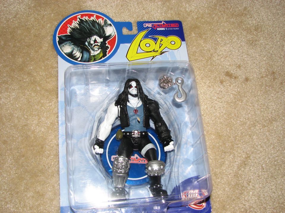 Lobo action figure in plastic packaging with a hook accessory