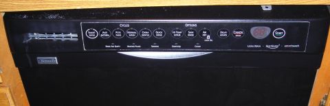 2003 Jeep TJ - Dishwasher control panel shows various wash cycles and options, including a digital display.