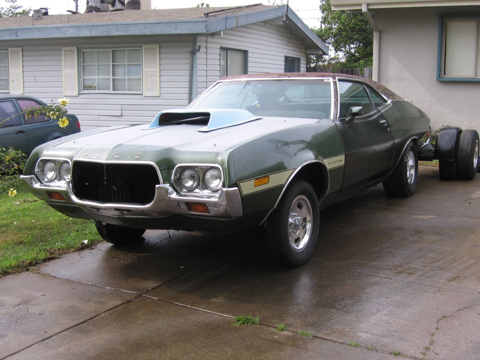 Green 1972 Ford Ranchero, 3q-front view, hood scoop, dual rear wheels
