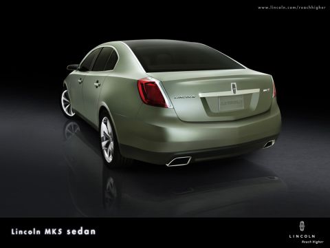 1993 Ford Taurus - The Lincoln MKS sedan is shown from a rear 3/4 angle against a black background.