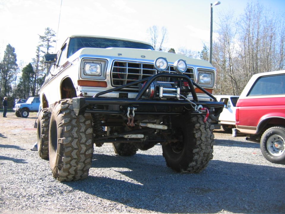 Lifted 1979 Ford truck front view with winch and off-road tires