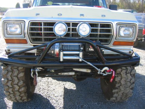 1992 Ford Mustang - Front view of a 1979 Ford truck equipped with a winch and off-road lights.