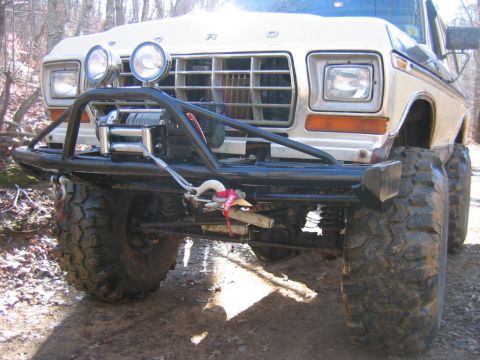 1992 Ford Mustang - This heavily modified 1979 Ford F-Series truck features a winch and large off-road tires, suggesting it's built for terrain.