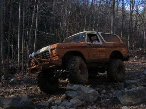 1992 Ford Mustang - This heavily modified 1978 Ford Bronco navigates a challenging rocky terrain.