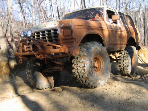 1992 Ford Mustang - This heavily modified 1978 Ford Bronco is covered in mud, ready for off-road adventure.
