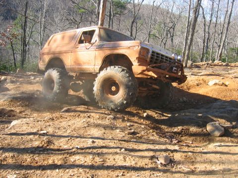 1992 Ford Mustang - This modified SUV navigates a challenging off-road course.