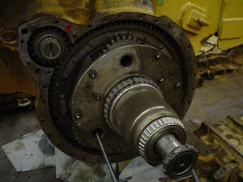 1966 International School Bus - Internal gearing and axle assembly of a heavy-duty vehicle, likely undergoing maintenance or rebuild.