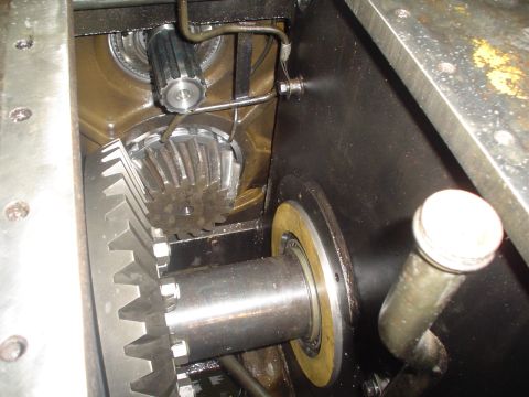 1966 International School Bus - Close-up view of internal differential gears, showing the meshing of a large ring gear with smaller pinion gears.