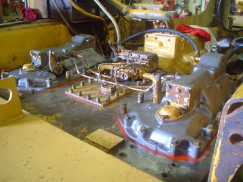 1966 International School Bus - Close-up view of complex engine components, likely part of a larger piece of heavy machinery.