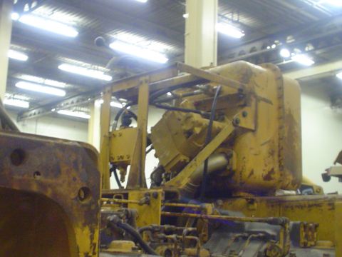 1966 International School Bus - This photo shows a part of yellow heavy machinery, not a 1966 International School Bus.