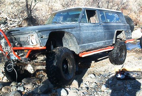 1986 Ford Bronco - This heavily modified Jeep Wagoneer is equipped for off-road adventures on a rocky trail.