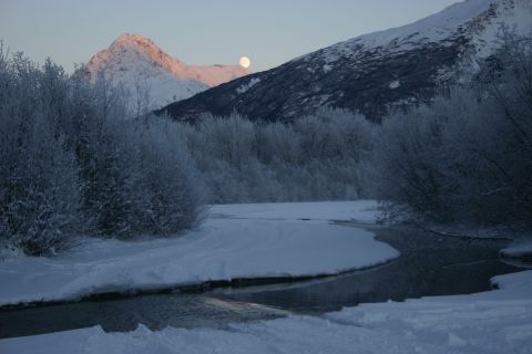 2003 Jeep TJ - Winter scene with a mountain peak illuminated by the sun and a full moon rising.