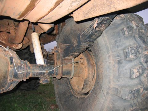1992 Ford Mustang - Rear axle and suspension components of a heavy-duty truck are visible in this close-up shot.