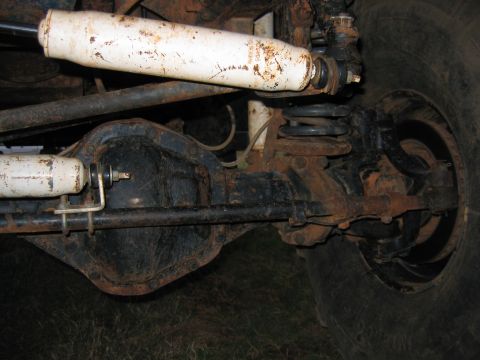 1992 Ford Mustang - The photo shows the underside of a vehicle, focusing on the rear axle and suspension components.