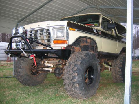 1992 Ford Mustang - This modified Ford Bronco features a lifted suspension and aggressive off-road tires.