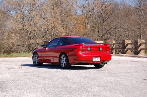 1996 Ford Probe - Rear view of a red 1996 Ford Probe coupe parked outdoors.