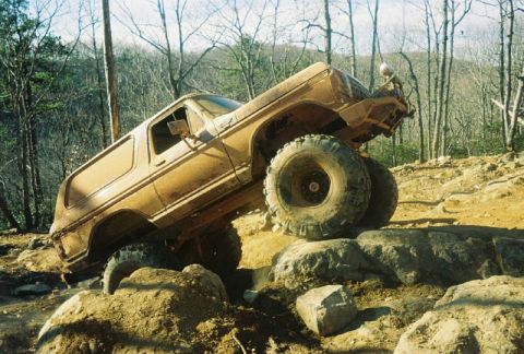 1993 Ford Bronco - This modified Ford Bronco is navigating a rocky off-road course.