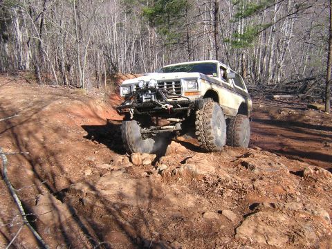 1979 Ford Bronco - A modified Ford Bronco navigates a challenging off-road course.